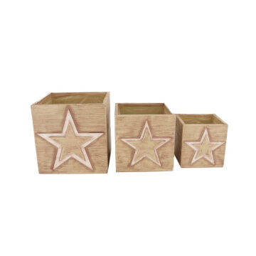 Tres cajas de madera con estrellas decorativas